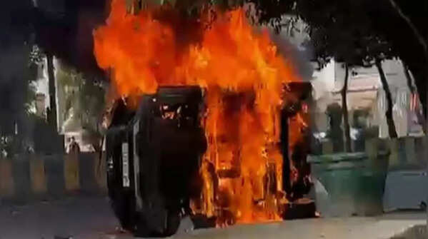 Vehicles vandalised, one set ablaze