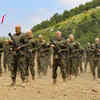 Article image for: Hezbollah fighters with Russian-made AK-103 rifles (Image credit: X)