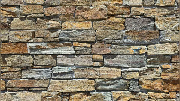 Natural Materials: Lime plaster, stone, and wood