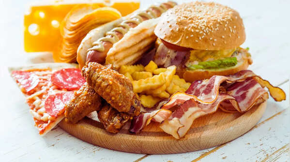 Consuming greasy and unhealthy meals right away
