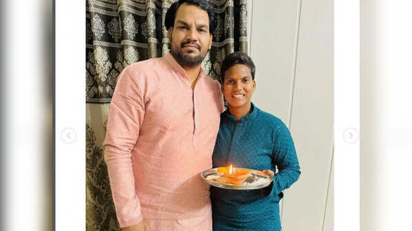 With her brother
