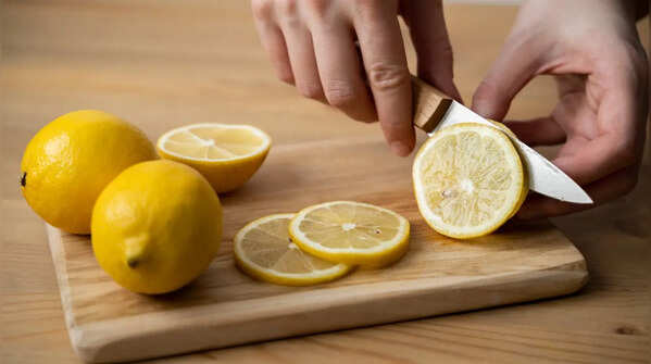1/2 cup (100 grams) of raw, peeled lemon provides: