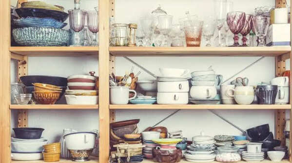 Storing clutter in kitchen cabinets