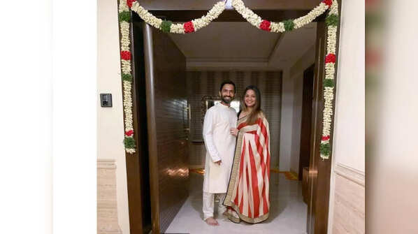 With her husband Dinesh Karthik