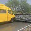 Article image for: Storm-toppled sign misses van in Moga