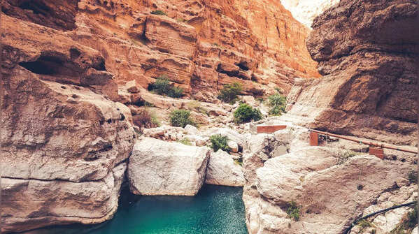 Why should travellers visit Snake Canyon