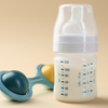 Plastic feeding bottle
