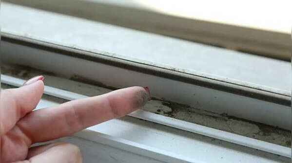 Clean window tracks and frames regularly