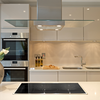 Install glass doors on cabinets to lengthen the space
