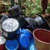 Article image for: Neglected old buckets, cans, and other containers