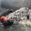 Article image for: Sanitation workers clean drains without safety gear