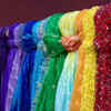 Fix traditional dupattas to wooden panels