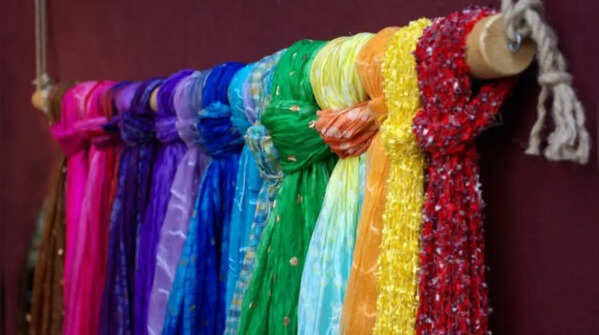 Fix traditional dupattas to wooden panels