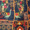 Use embroidered dupattas as wall art
