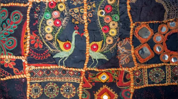 Use embroidered dupattas as wall art