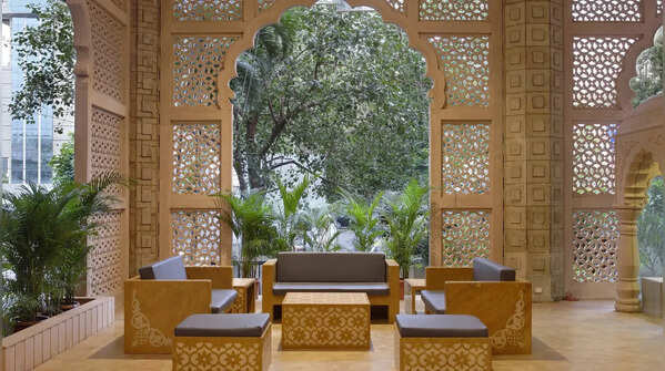 Add wooden furniture with Rajasthani design
