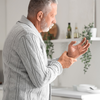 Who is more likely to experience hand tremors?