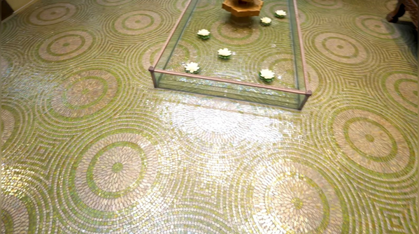 Indoor fountain with Italian mosaic flooring