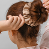 Article image for: 2. Twisting wet <i class="tbold">hair</i> into a bun and rushing out