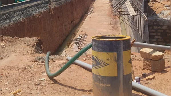 Retaining walls, tree clearing and service roads are now visible on ground