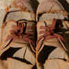 Torn shoes or damaged footwear