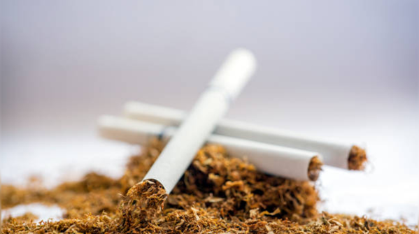 Does bad breath caused by tobacco use sometimes signal something more serious happening inside the mouth or gums?
