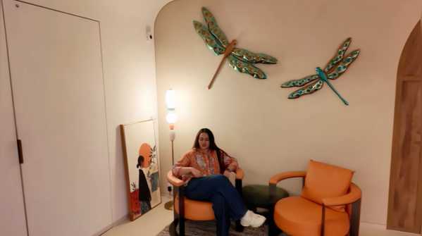 Orange cozy corner with metallic dragonflies
