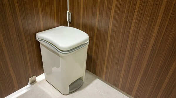 Use closed dustbins in bathrooms for hygiene reasons