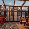 Glass house with a scenic mountain terrace view