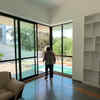 Big living room complete with French windows