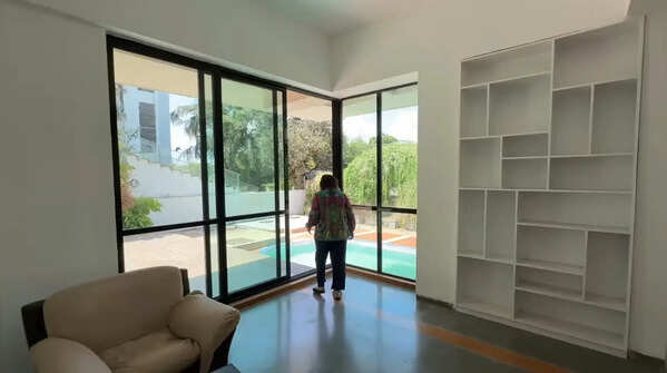 Big living room complete with French windows
