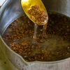 How do flaxseeds help in curling hair?