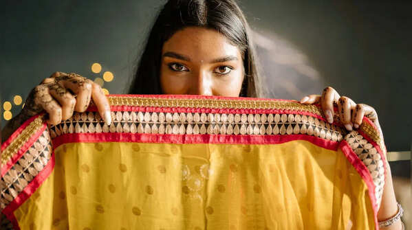 Take a dupatta; guests are coming