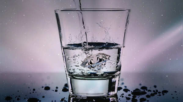Stay hydrated with small sips of water