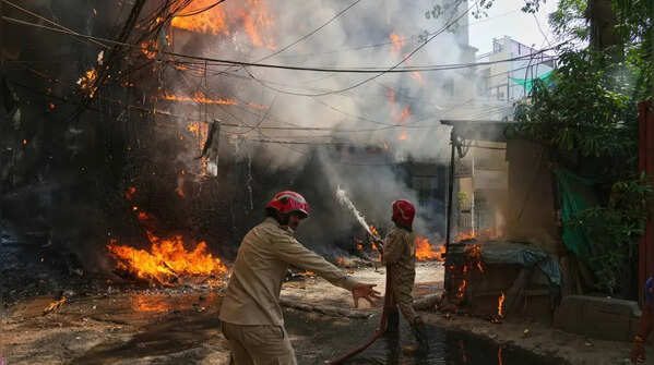 Scenes of chaos as flames spread through building
