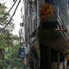 Low-hanging cables amid congested homes