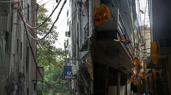 Low-hanging cables amid congested homes