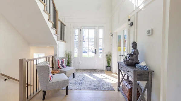 Minimalist foyer with hidden storage