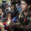 CJP spokesperson Saurav Das holds flower while addressing media