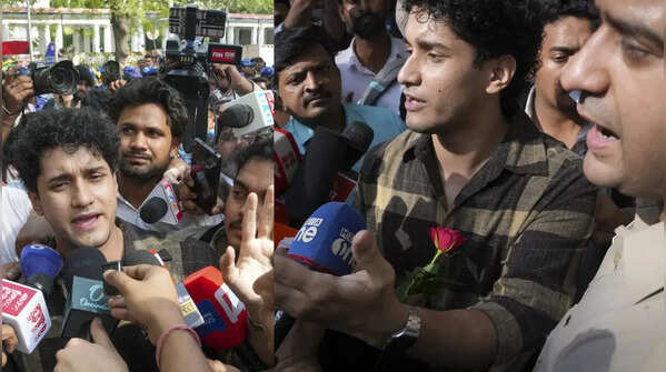 CJP spokesperson Saurav Das holds flower while addressing media