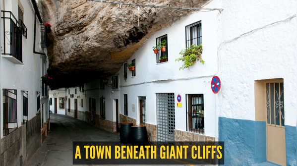 This town is built under massive cliffs and is becoming a must-visit destination