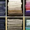 Use uniform hangers and storage containers