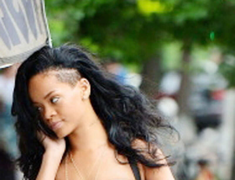 Rihanna goes braless, flashes nipples!