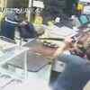 Article image for: Caught on camera: Man thwarts <i class="tbold">robbery</i> with machete