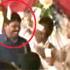 Article image for: Caught on camera: BJP leader throws cash at religious event