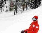 Kimi Raikkonen snowboards