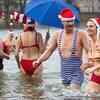 Article image for: Xmas: Swimmers take <i class="tbold">cold plunge</i> in Berlin, London