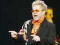 Elton John performs