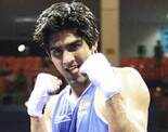 Vijender storms into semis