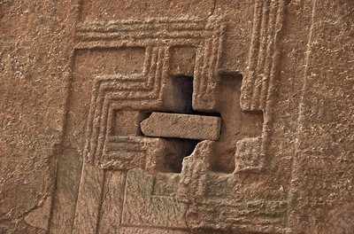 Priest in Bet Danaghel Church holding the Cross of King Lalibela. The  rock-hewn churches of Lalibela make it one of the greatest  Religio-Historical sites not only in Africa but in the Christian